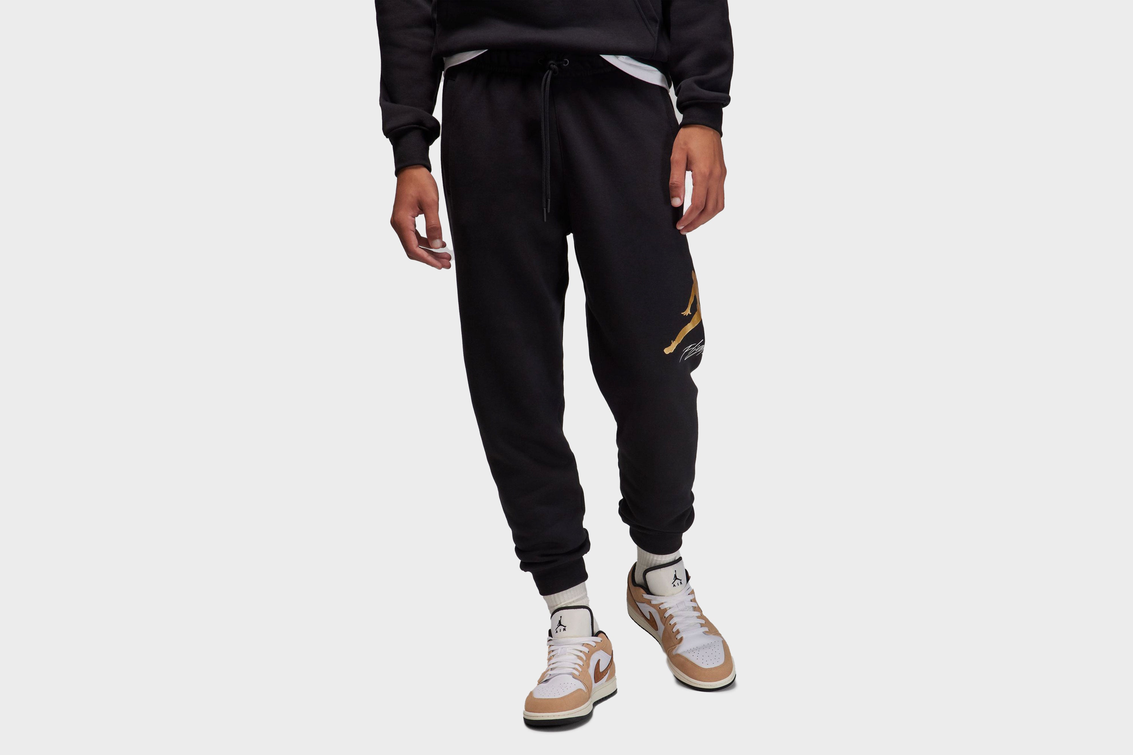 Jordan sweatpants black and gold sale