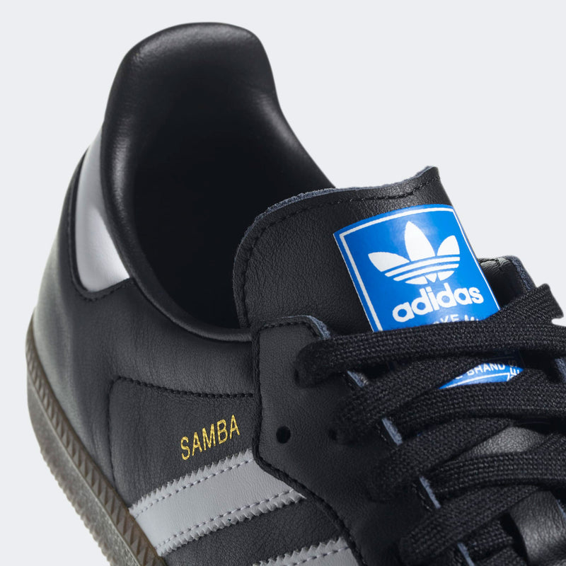 adidas Originals Samba sneakers in black and blue with gum sole