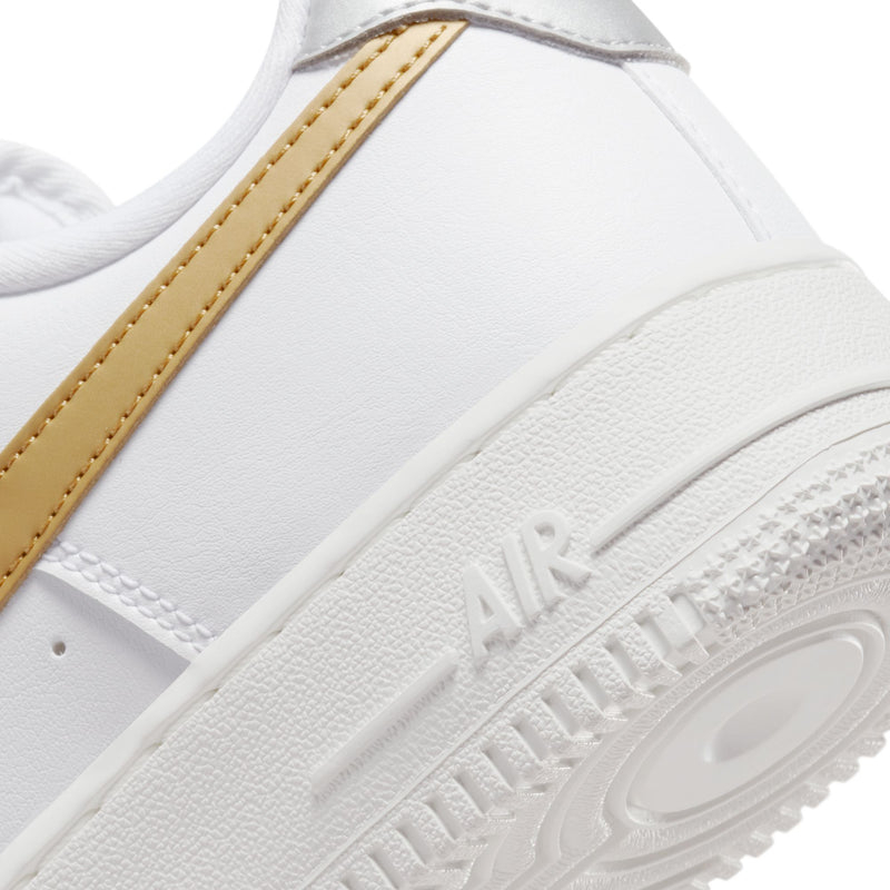 Nike Air Force 1 '07 sneakers in white and gold metallic